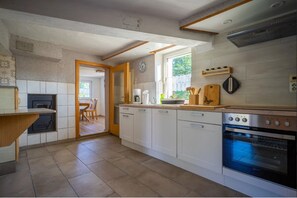 Fridge, stovetop, coffee/tea maker, electric kettle
