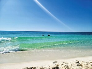 A beach with clear turquoise water and a sandy shore. - Very Private Home w/ HEATED Pool, Palm Trees and Big Fenced Yard. (Pensacola)