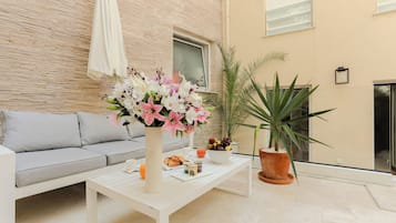 Quarto luxo, terraço | Terraço/pátio