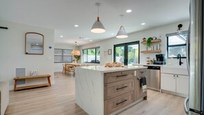 Fridge, microwave, oven, stovetop - Coco Loco Oasis: Boho-Luxe Escape with Saltwater Pool Near Deerfield Beach! (Deerfield Beach)