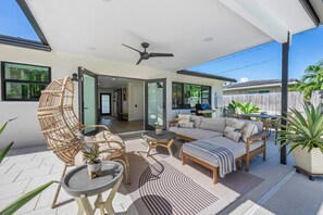 Outdoor dining - Coco Loco Oasis: Boho-Luxe Escape with Saltwater Pool Near Deerfield Beach! (Deerfield Beach)