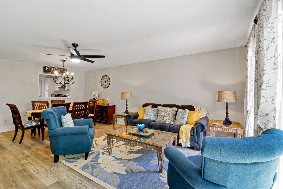 Recently updated with private patio and steps away from the beach