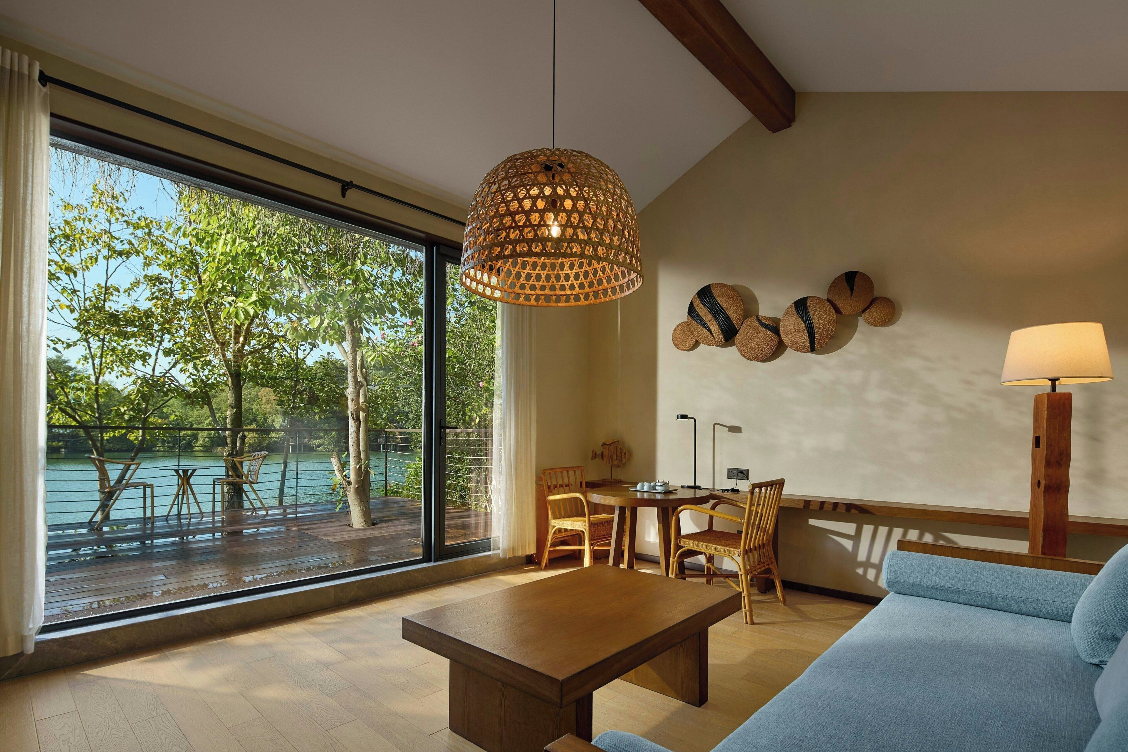 Suite, 1 Bedroom, Lake View | Living room | 50-cm LED TV with cable channels, ping pong, heated floors