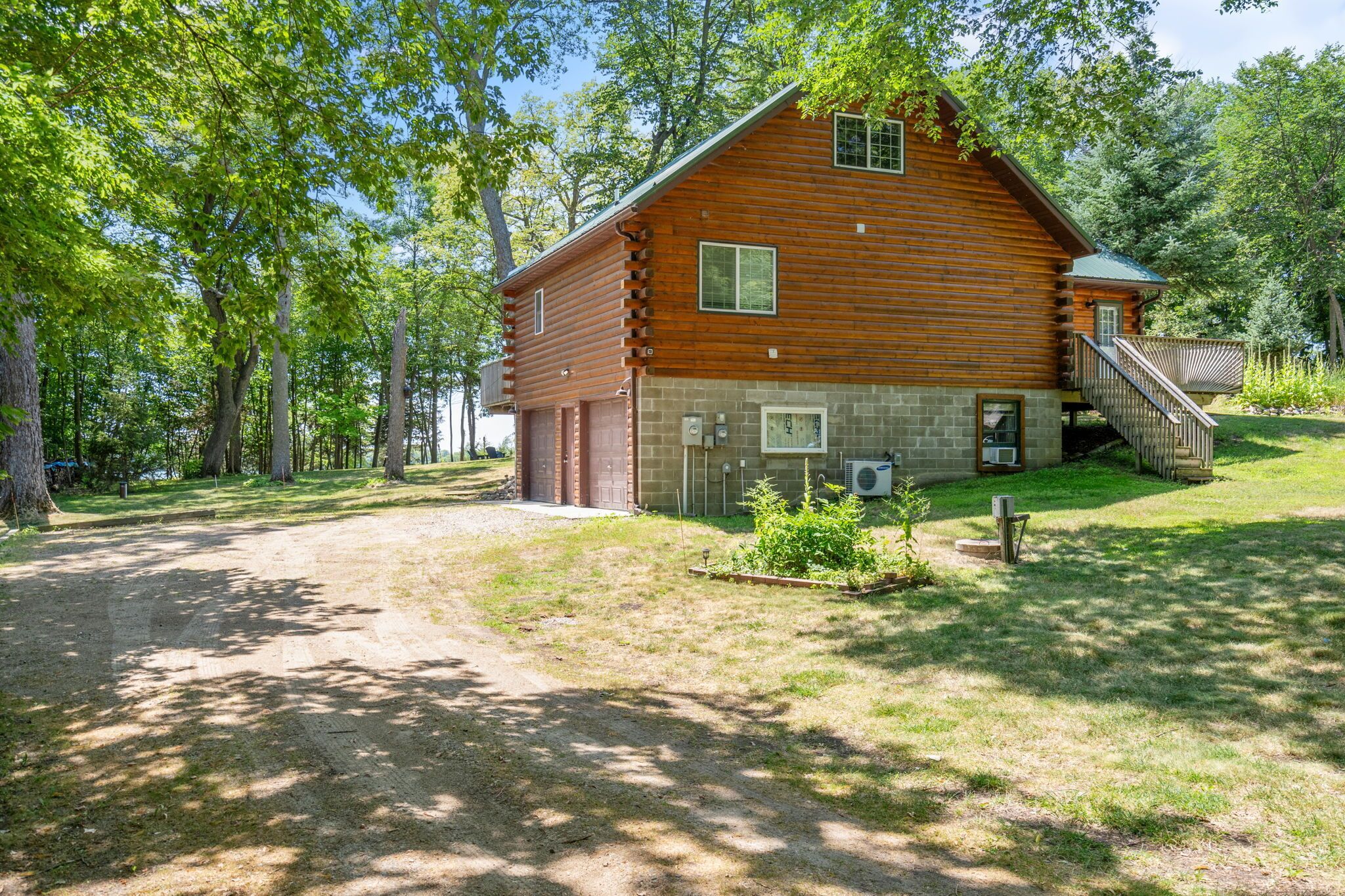 Beautiful cabin on lake with a dock on 1.5 acres private property
