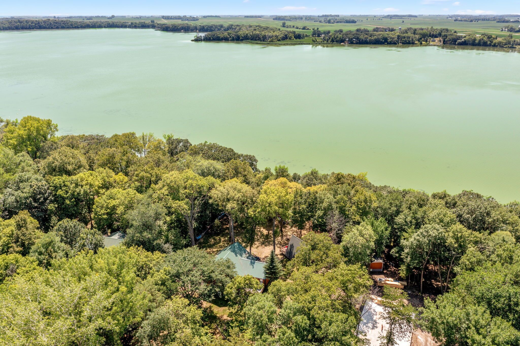 Beautiful cabin on lake with a dock on 1.5 acres private property