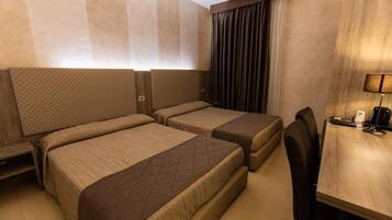 Quadruple Room, 2 Double Beds | Memory foam beds, minibar, individually decorated, desk