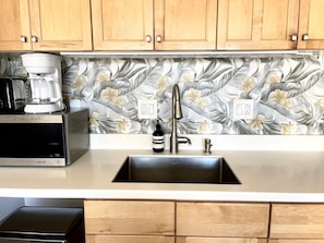 Fridge, microwave, stovetop, coffee/tea maker