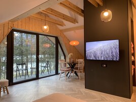 Panoramic Apartment | Living area | 60-cm Smart TV with digital channels, TV