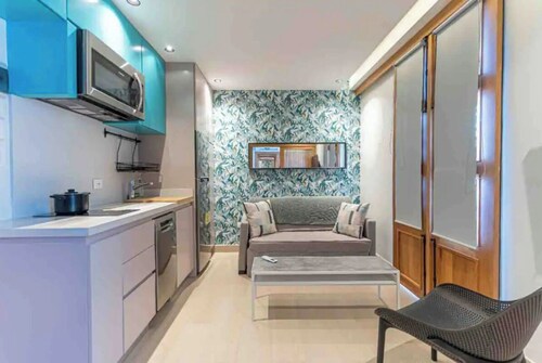 T3 Suite con balcón y cocina en el centro