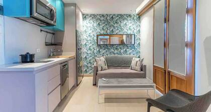 T3 Suite con balcón y cocina en el centro