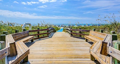 Ocean-view condo, 1 block from beach with enclosed balcony & pool