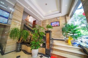 Unclassified image, 5 of 17, button - Yi Long Hua Chen Impress Business Hotel (Yilong)