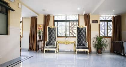 Yi Long Hua Chen Impress Business Hotel