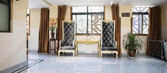 Yi Long Hua Chen Impress Business Hotel