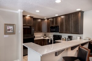 Fridge, oven, coffee/tea maker, toaster