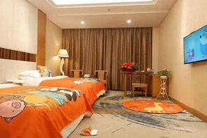 A hotel room with two beds, a desk, a chair, a TV, and a curtain. - Island Hotel (Dongshan County)