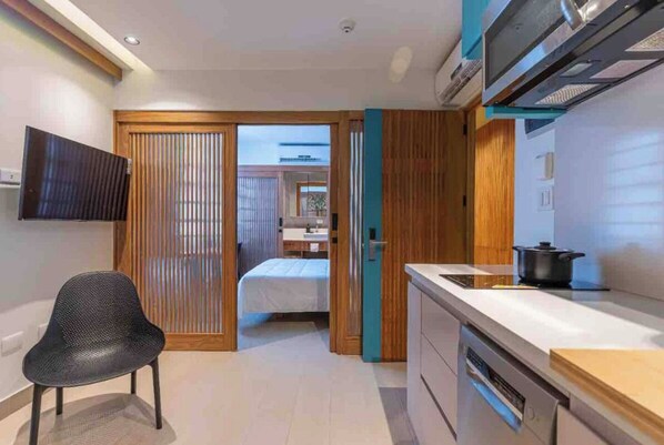 Microwave, dishwasher, dining tables