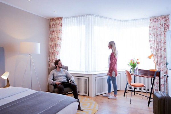 Habitación doble | Ropa de cama hipoalergénica y caja fuerte