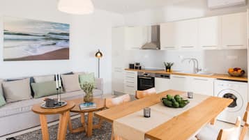 Comfort House, 2 Bedrooms, Sea View | Living area | 32-inch flat-screen TV with satellite channels, TV, offices