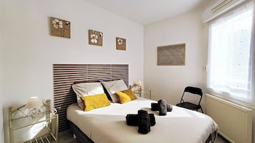 2 slaapkamers, een strijkplank/strijkijzer, gratis wifi, beddengoed