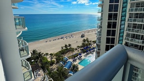 A high-rise hotel with a view of a beach and a swimming pool. - Marenas Beach Resort (Sunny Isles Beach)