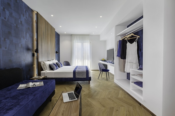 Chambre Triple Supérieure | Couette en duvet d'oie, minibar, coffres-forts dans les chambres