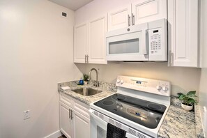 Fridge, microwave, stovetop, coffee/tea maker