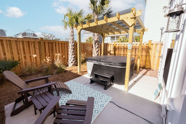 Private patio with hot tub