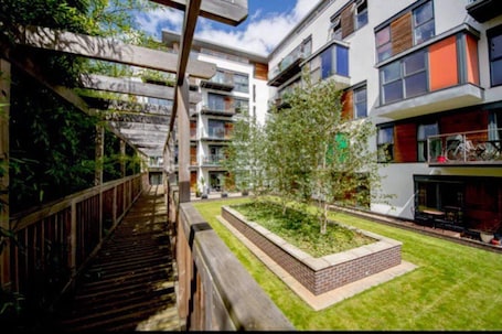 Apartment | Property grounds. Amazing Riverside Boheme Home in SW London!
