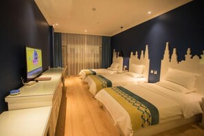 A hotel room with two beds, a TV on a stand, and a window with curtains. - Kangjie Hotel (Kaiyuan)