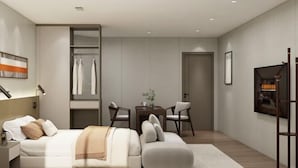 A modern bedroom with a bed, bedside tables, a desk, chairs, and a wardrobe. - Fengyuanju Business Hotel (Zhongshan)