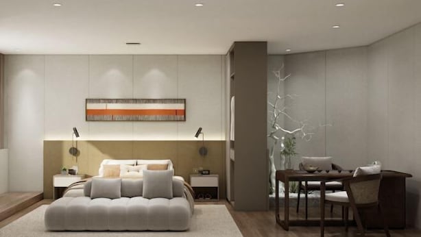 A modern bedroom with a large bed, bedside tables, a desk, and a chair. - Fengyuanju Business Hotel (Zhongshan)