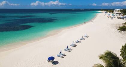 2 Bedroom Condo- Next door to Zemi Beach Hotel for 1/4 the price!