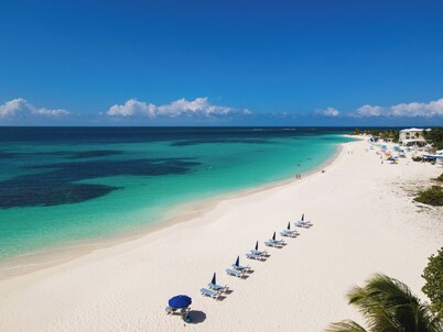 2 Bedroom Condo- Next door to Zemi Beach Hotel for 1/4 the price!