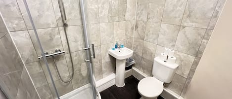 Shower, free toiletries, towels, soap