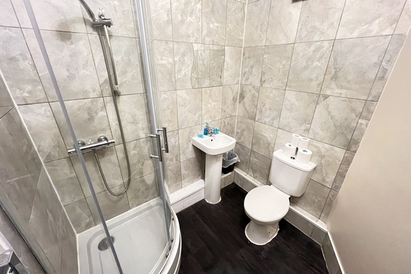 Shower, free toiletries, towels, soap