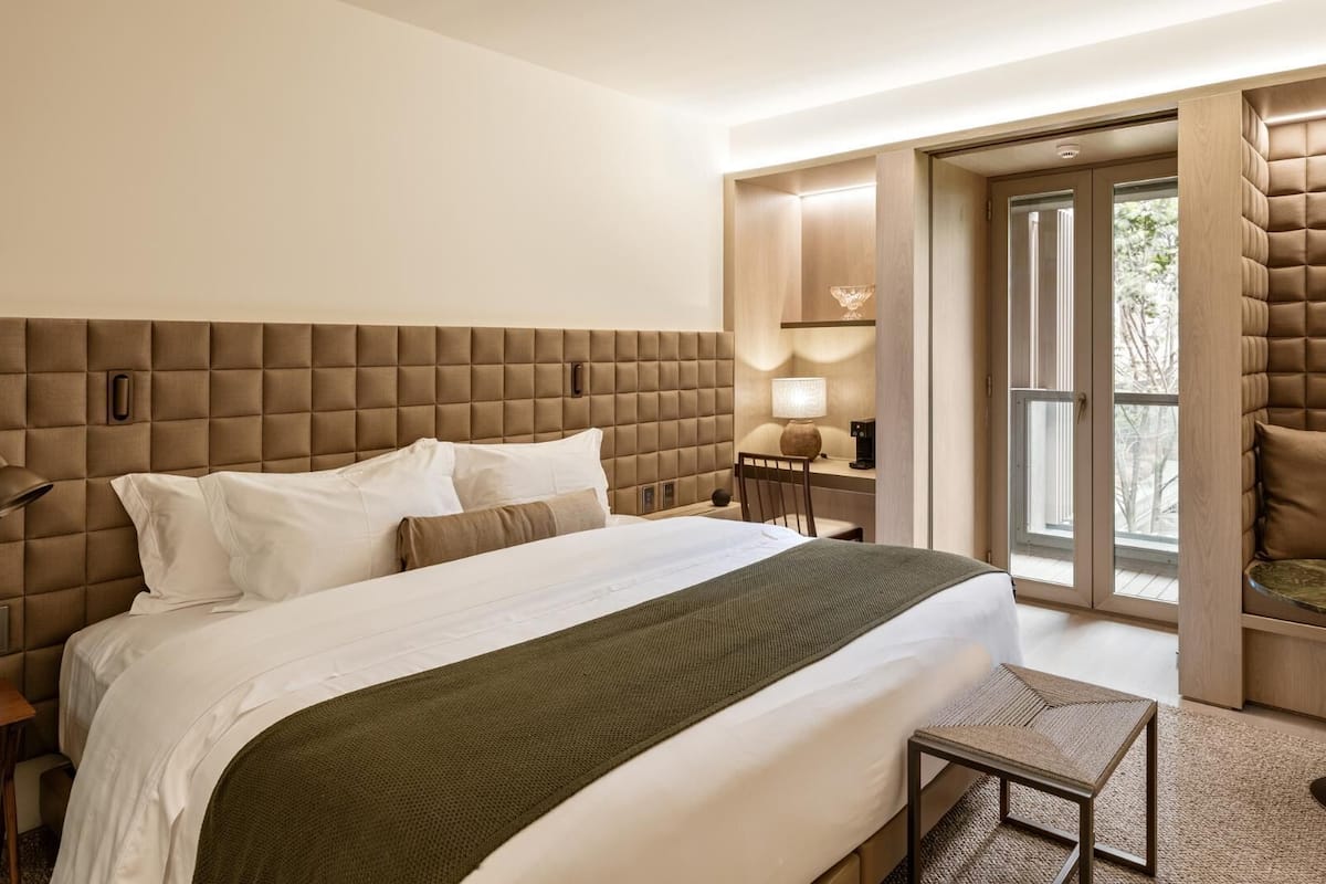 Premium bedding, down comforters, pillowtop beds, minibar