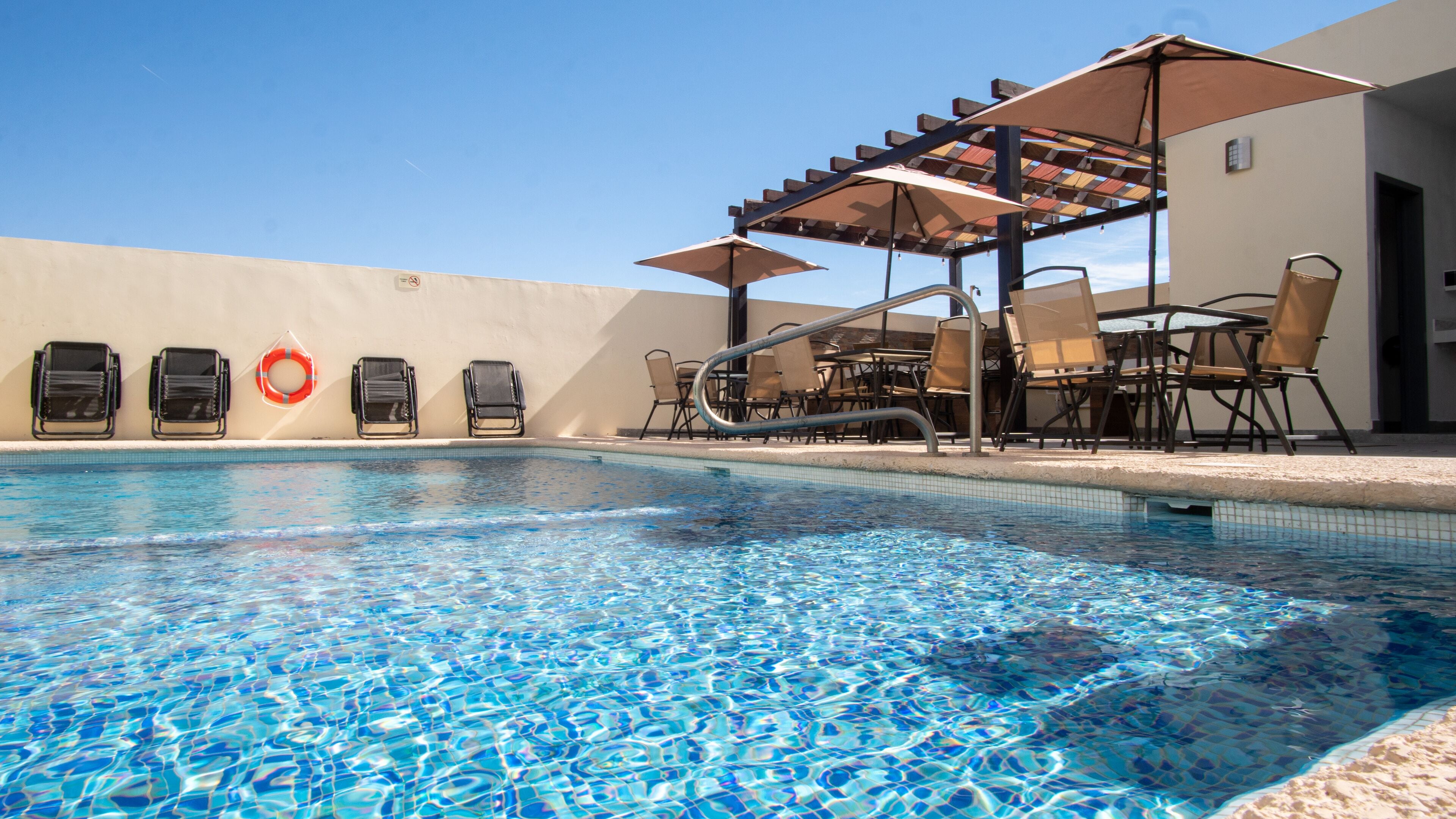 Outdoor pool, sun loungers