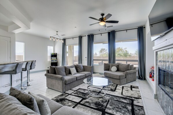 TV, fireplace, books, offices - 'Casa Del Sol' - Cozy Oasis in Desert Hot Springs! (Desert Hot Springs)