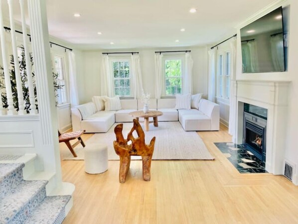 Smart TV, fireplace, books