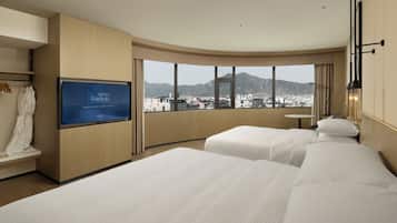 Family Suite, 2 Double Beds, City View | Down comforters, in-room safe, blackout drapes, soundproofing