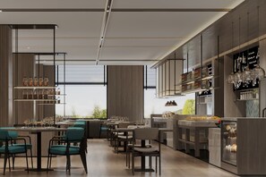 Een modern restaurant met een lange toonbank, verschillende zithoeken en een ruim aanbod aan eten en drinken.