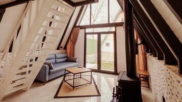 Standard Bungalow | Living area | 55-inch LED TV with satellite channels, TV, fireplace