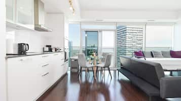 Luxury Condo | Living area | 43-inch Smart TV with satellite channels, TV, Netflix