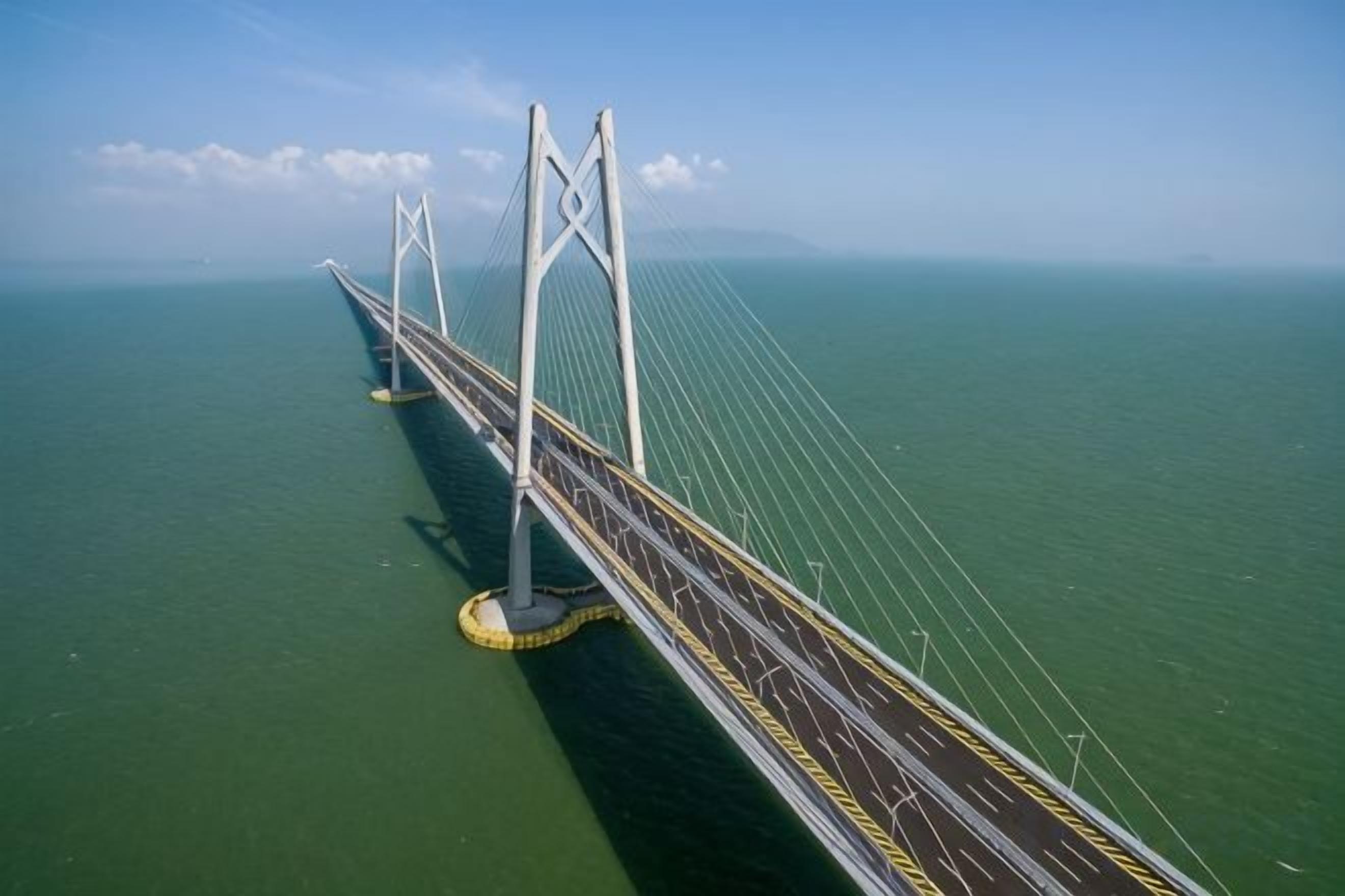 A long suspension bridge over a body of water.