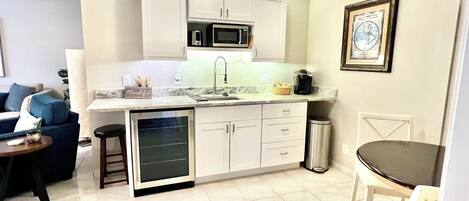 Fridge, microwave, coffee/tea maker, toaster