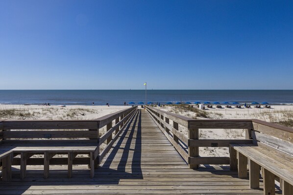Walk along the boardwalk to the ocean and enjoy the view from one of the benches.