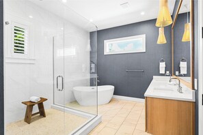 Shower, hair dryer, towels