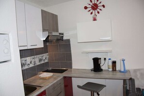 Fridge, toaster, cookware/dishes/utensils
