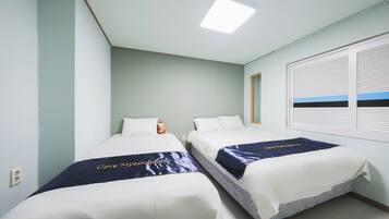 Standard Triple Room | Tempur-Pedic beds, laptop workspace, blackout drapes, iron/ironing board